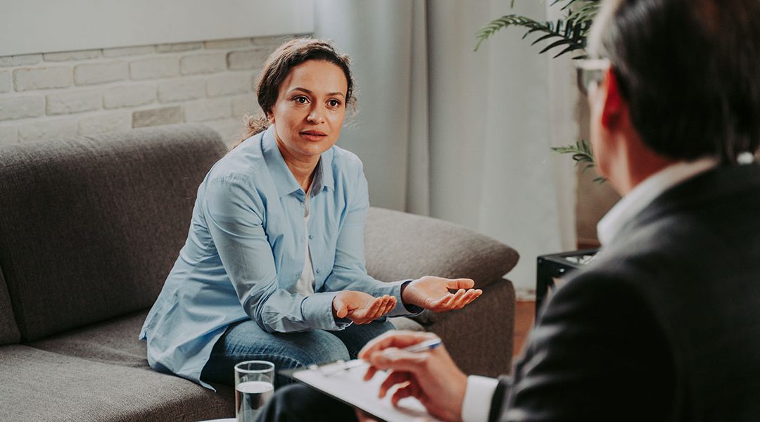 Adult woman with doctor discussing late neurodiversity diagnosis