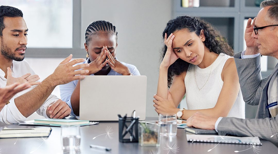 Group of coworkers annoyed with another.