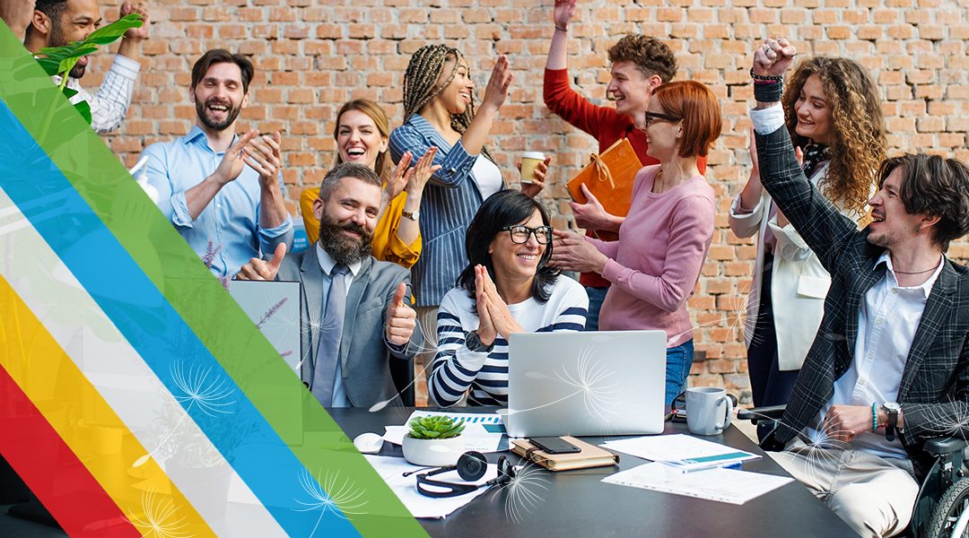 Group of diverse coworkers celebrating; Disability Pride stripes and white dandelion seeds floating across the image.