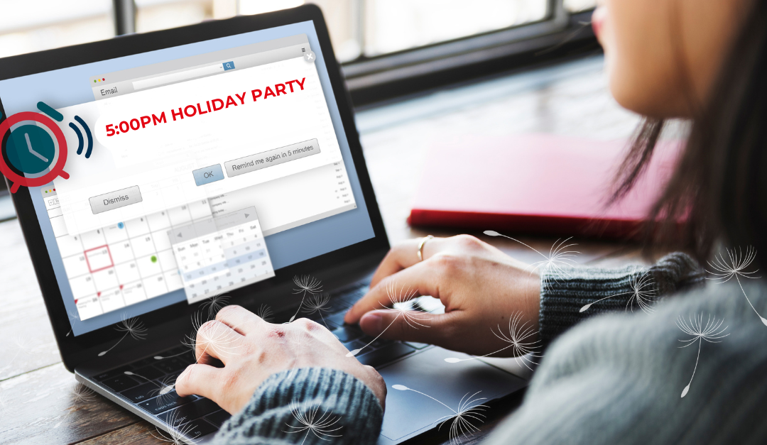 Woman getting an alert for a 5pm office holiday party on her laptop.